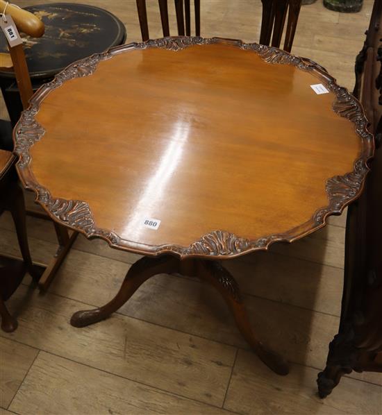 A George III style mahogany tilt top tea table, on tripod base Diameter 78cm